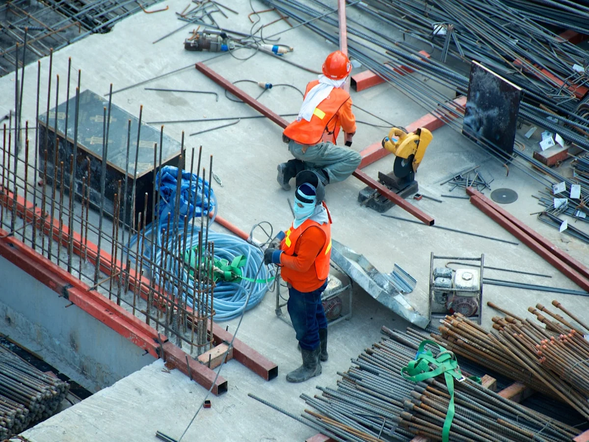 Roofing contractor reviewing a branded proposal on a tablet